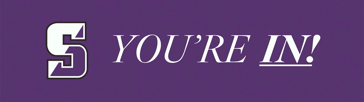 A purple banner featuring the white and purple Scranton logo on the left, next to the white, italicized text 'YOU'RE IN!' where 'IN!' is underlined